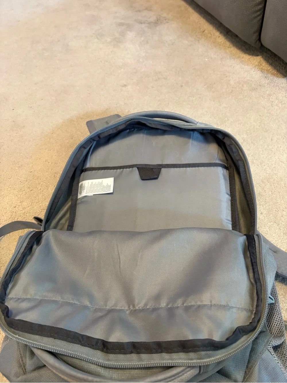The North Face Gray Women’s Backpack with Light Blue Bungee